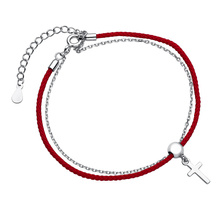 Srebrna pr.925 bransoletka z czerwonym sznurkiem - krzyżyk